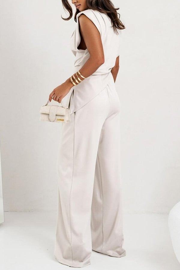 Dames set met plooischouders en wijde broek