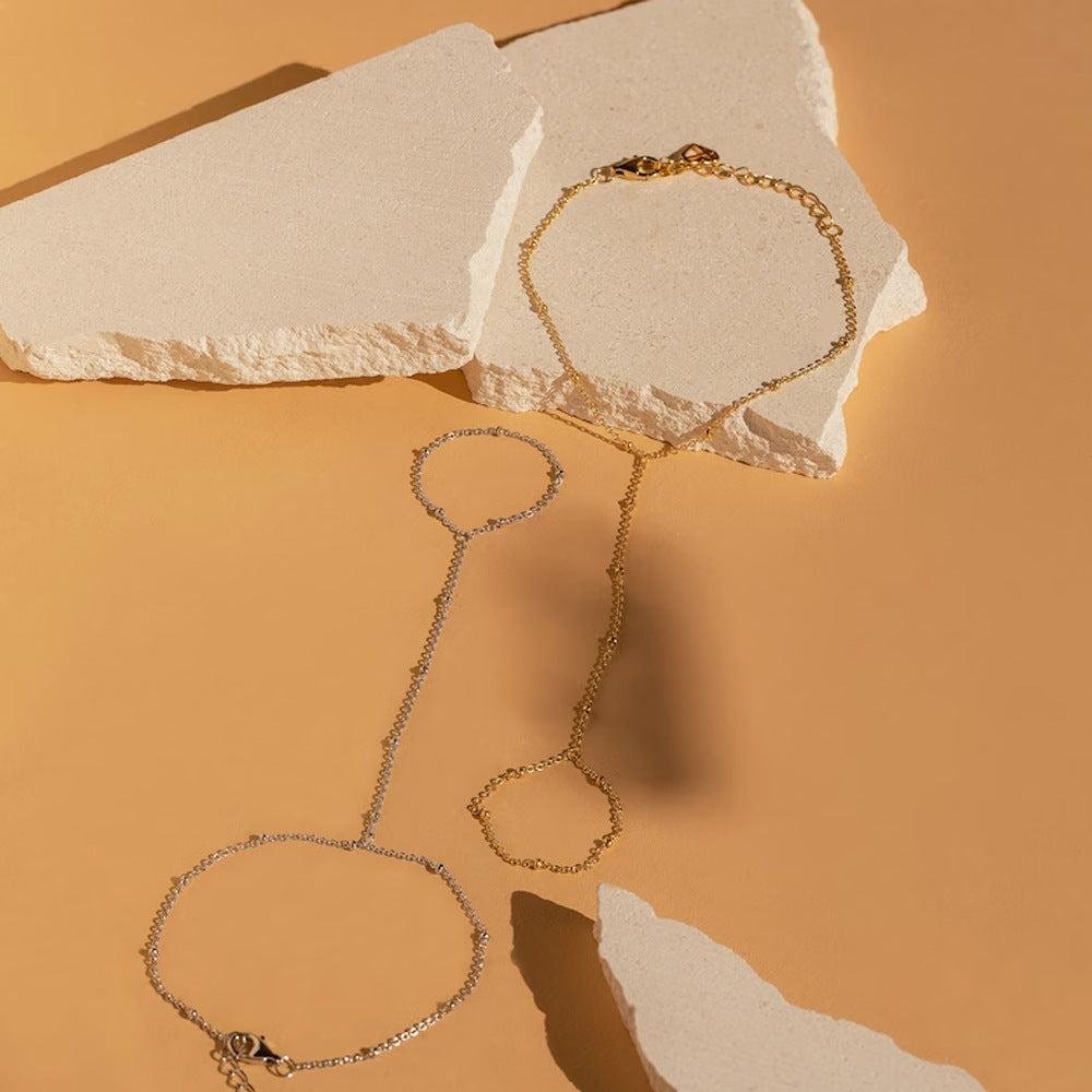 Goudkleurige handketting met ring voor vrouwen