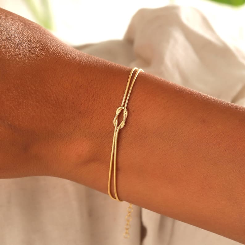 Dames Armband met Knoop | Liefdesknoop Goud/Zilver Armband