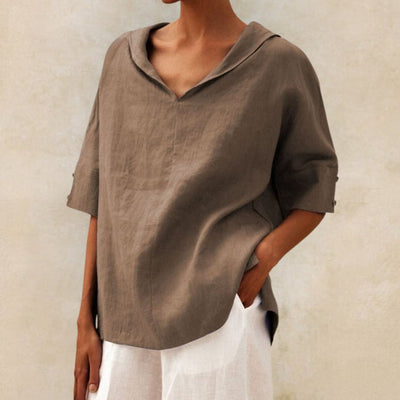 Damesblouse met V-hals en knoopmouwen