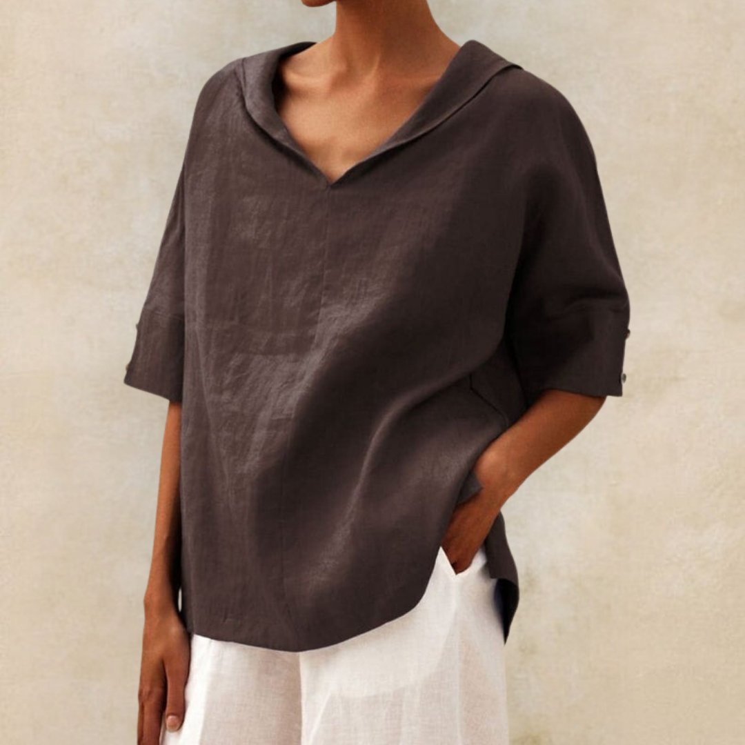 Damesblouse met V-hals en knoopmouwen